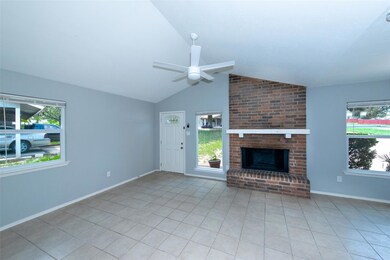 Unfurnished living room with a ceiling fan, light
