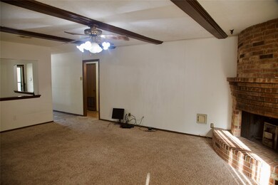 Living room looking towards dining room and front
