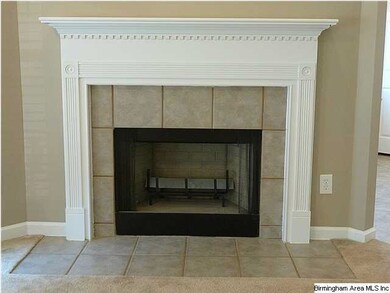 Closer view of the wood burning fireplace