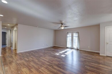 Spare room featuring dark hardwood / wood-style fl