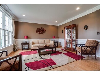 Formal LIving Room with wood floor, multi-member c