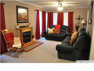 very spacious living room with fireplace