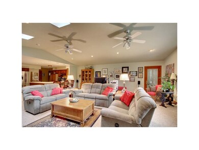 Great room connected to large eat in kitchen.