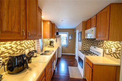 GAS RANGE AND TONS OF CABINET STORAGE