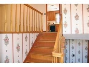 Hardwood foyer stairs