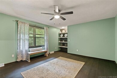 Main bedroom w/ built-in shelving