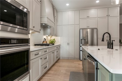 Lots of storage in this kitchen with hidden pantry