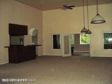 Upstairs LR into sunroom and bar area