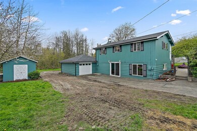 Yard is a bit torn-up due to a new 4-bedroom septic installation just completed.