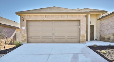 Garage with concrete driveway