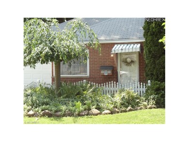 CHARMING FRONT ENTRANCE WITH PERENNIAL GARDENS GRE