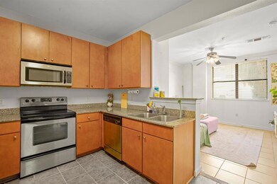 Kitchen with appliances with stainless steel fini