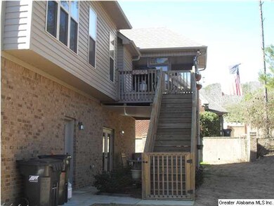 Covered and open patio off the basement den