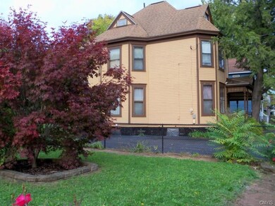 Fenced in side yard and double wide driveway. Seco