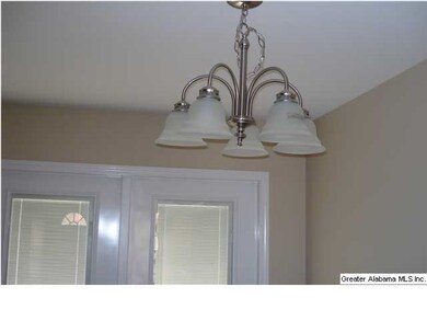 light fixture in eat-in kitchen