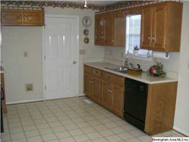 Kitchen is large and roomy.