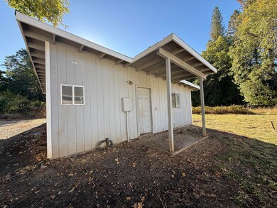 side of shop entry door - awning too.