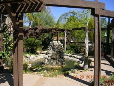 Koi Pond Waterfall off covered patio back yard tha