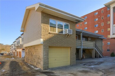 BLDG 4  2 UNITS WITH 5 GARAGES