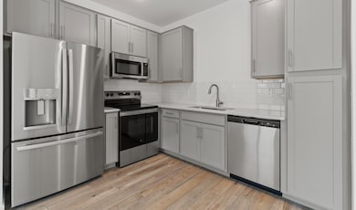 Kitchen with stainless steel appliances