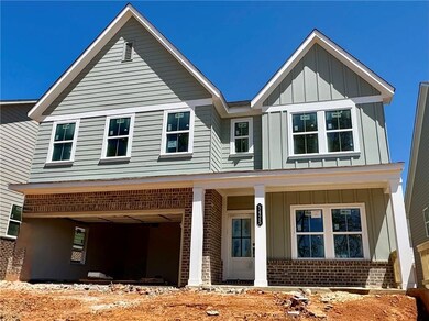 Popular Savoy plan with front porch overlooking gr