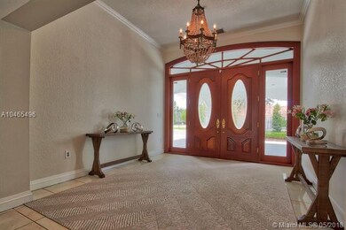 Foyer with elegant entrance, super tall ceilings (