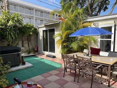 A private OASIS both hot tub, table and chairs will convey.