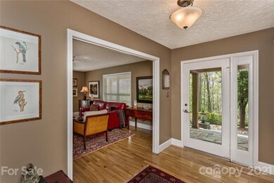 foyer entry, access to kitchen, hall way to bedroo
