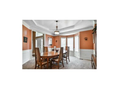 To your left is the formal dining room with tiered