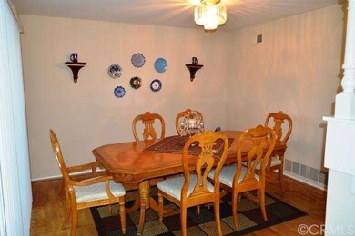 Another view of Formal Dining Room, hardwood floor