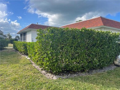 View of property exterior featuring a yard
