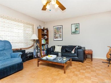Living Room is spacious and filled with natural li