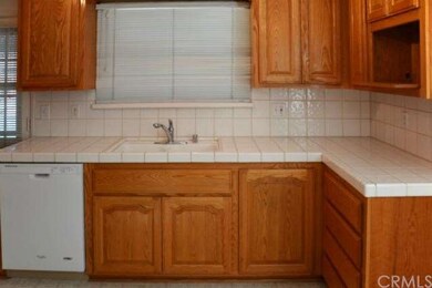 The warm glow of the cabinetry in the kitchen.