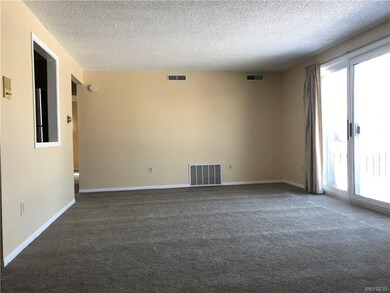 Oversized living room, brand new carpeting and fre