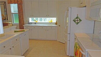 Kitchen with glass block window
