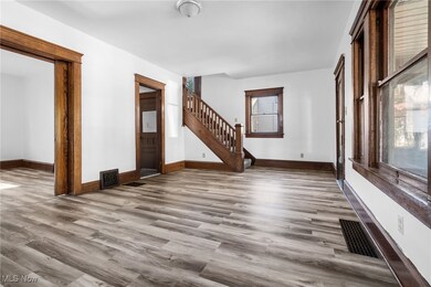 Living room with LVT and original woodwork