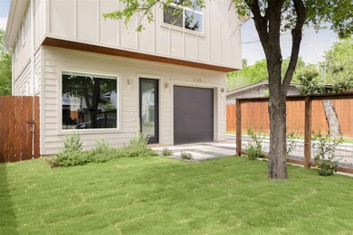 View of front facade with a front yard, board and