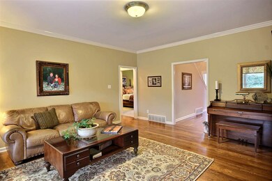 Real hardwood floors and smooth ceilings throughou
