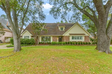 Charming two-story brick home with a welcoming fro