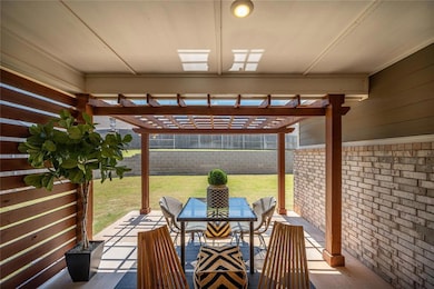 Fenced backyard featuring a pergola, a patio area, and outdoor dining area