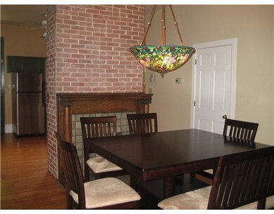 Dining Room. Unique floor plan and barick decorati