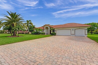Beautifully pavered driveway.