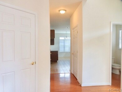 Foyer view into kitchen - laundry room to the left