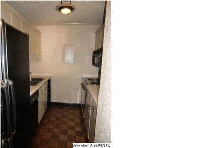 Kitchen has all appliances including refrigerator 