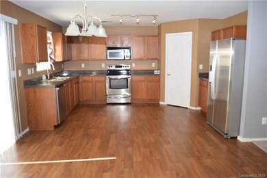 Kitchen with stainless steel appliances. Newly ins