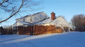 Exterior Back:  Private patio in large .43 acre lot!