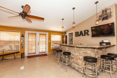 DOUBLE DOORS OFF OF THE BAR AREA