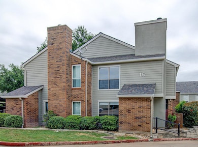 View of front of house with roof with shingles, a