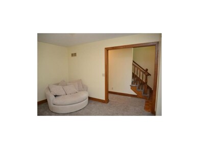 Cozy front room is perfect , with views of the fro