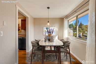Cozy dining room with plenty of natural light.